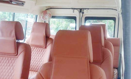 9 seater deluxe 1x1 tempo traveller